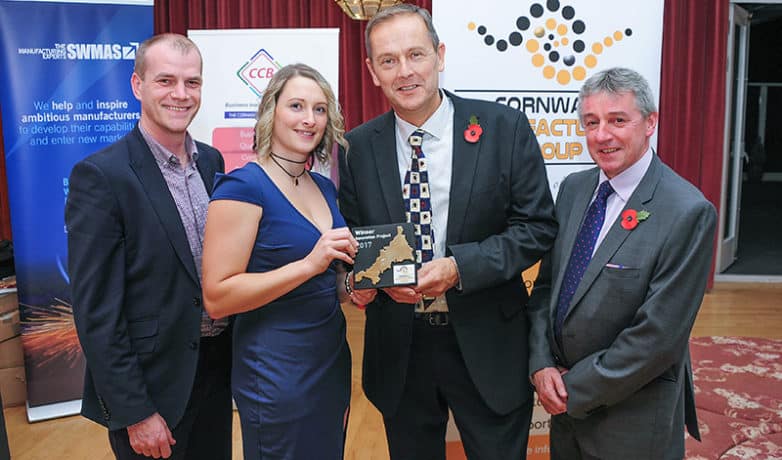 Stephen Leonard-Williams and kelly Ellis collect the award